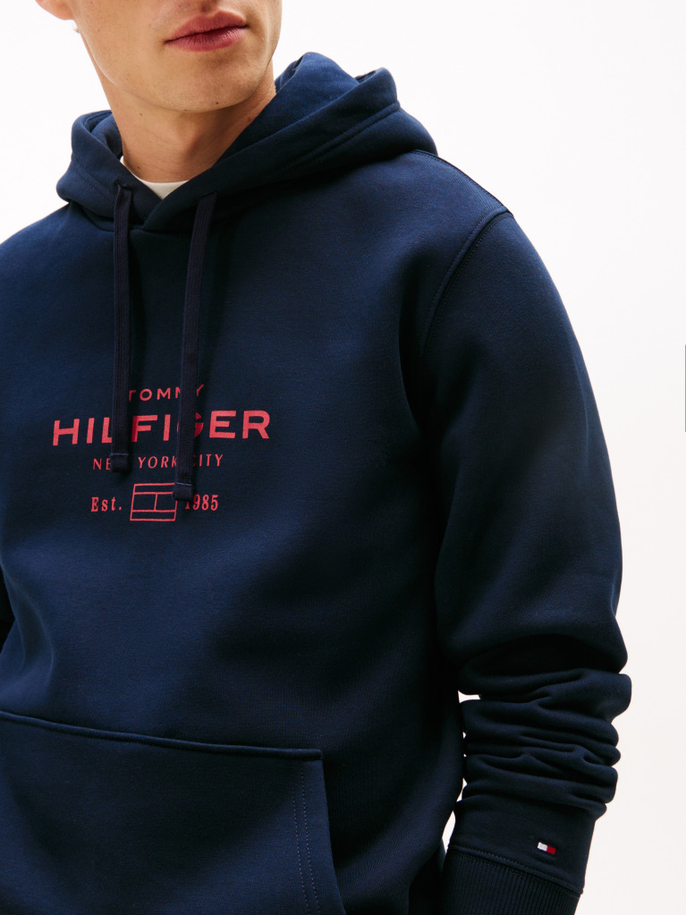 Blue Perfect for fighting the cold, this warm hoodie is enhanced with a stylish, tonal Tommy Hilfiger logo and crafted from high-quality interlock knit.  Men