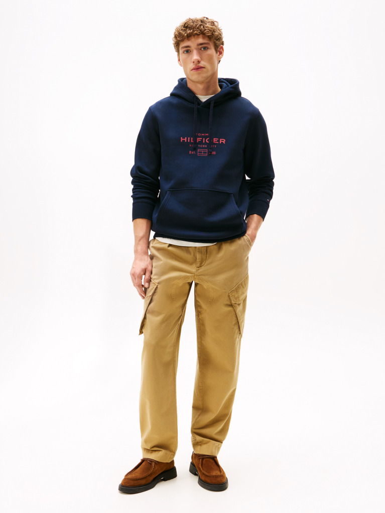 Blue Perfect for fighting the cold, this warm hoodie is enhanced with a stylish, tonal Tommy Hilfiger logo and crafted from high-quality interlock knit.  Men